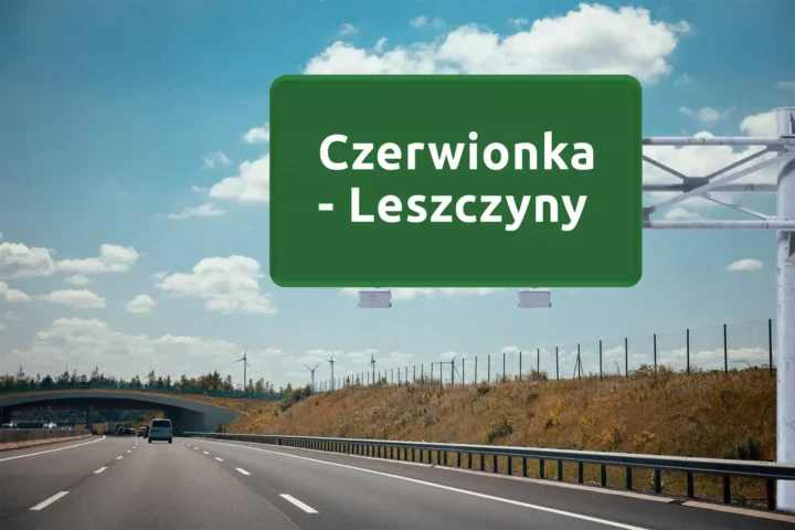 duży, zielony znak drogowy z nazwą Czerwionka - Leszczyny, wiszący nad autostradą