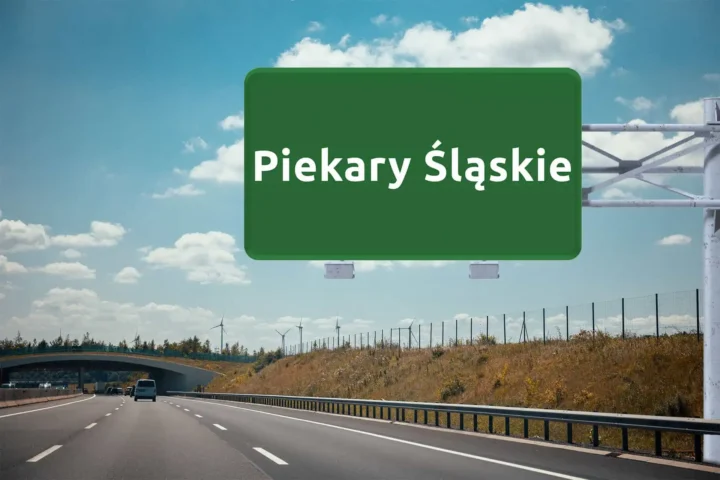 duży, zielony znak drogowy z nazwą Piekary Śląskie, wiszący nad autostradą